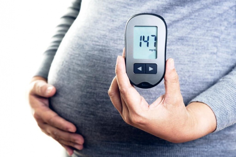 Kaj je gestacijski diabetes? Kaj povzroča nosečniški sladkor? Kako poteka test obremenitve sladkorja?