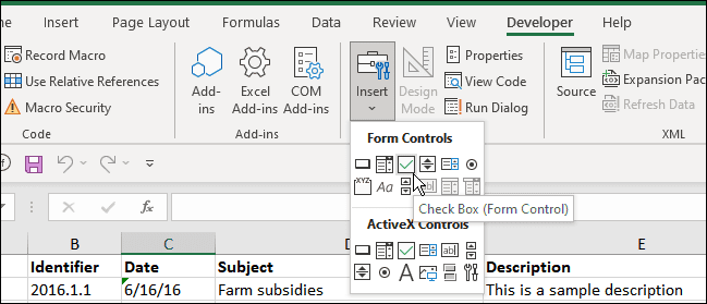 vstavite potrditveno polje razvijalec Excel