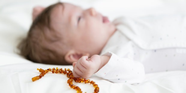 oranžne ogrlice in zapestnice za dojenčke